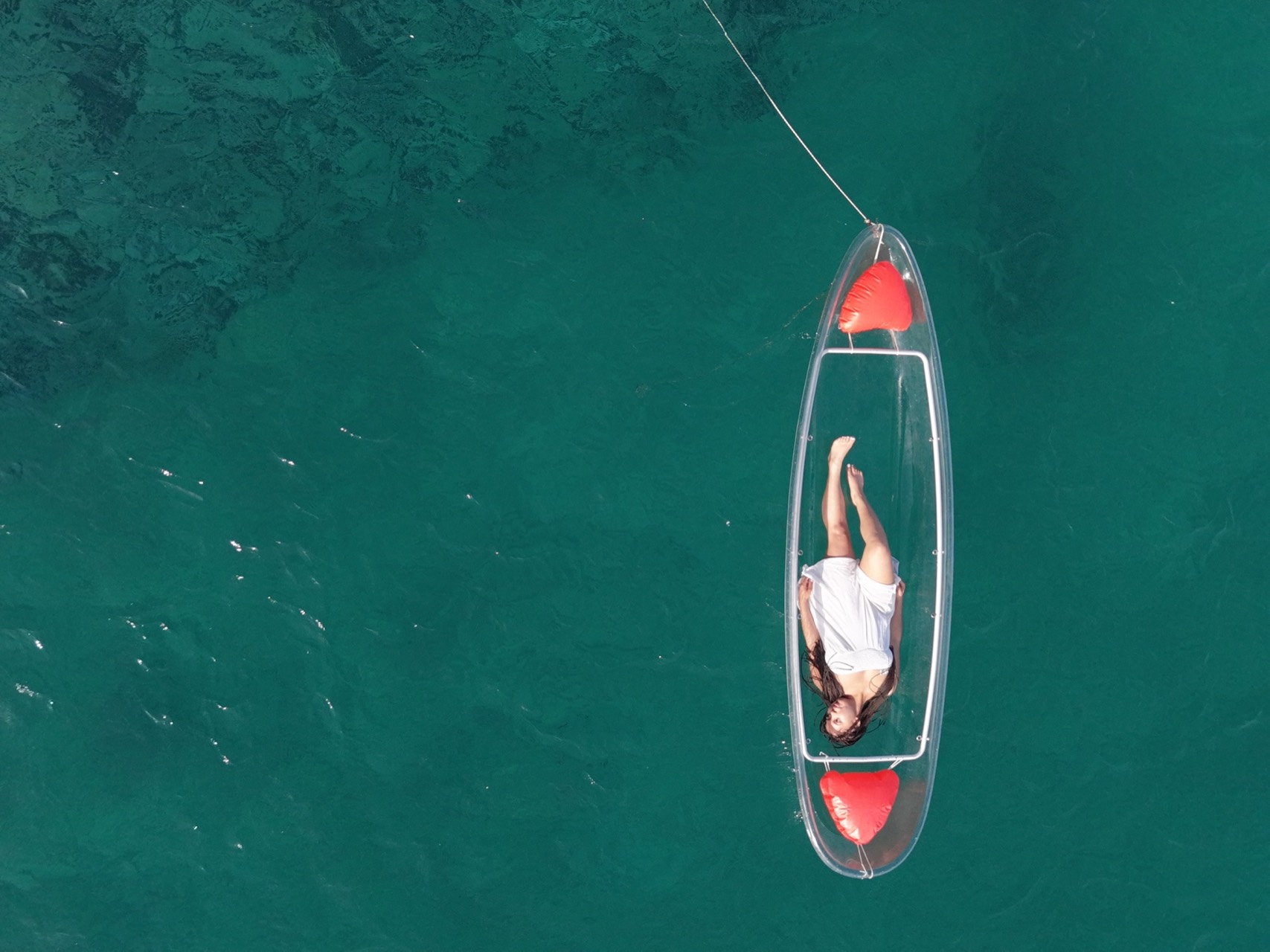 Kayak transparent rouge